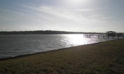 Beautiful waterfront site in small gated property of custom homes. Listing originally posted at http