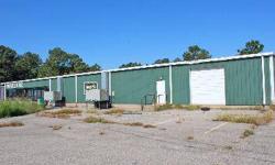 The property consists of three metal buildings, all centrally heated and cooled. The retail building formerly a furniture business location is 11,875 sq. ft built in '02. the warehouse building is 11,240 sq.ft built in '99. The storage building is 6,175