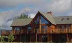 Quintessential Colorado Mountain Home in a stunning and pristine setting. Northern white cedar home, southern exposure for solar gain, wrap-around deck, large spaces for family gatherings, bonus office/studio above garage, huge VIEWS in every direction
