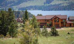 Montana style home in the trees w/ views of Canyon Ferry Lake & 2 minutes from Kim's Marina. Custom home - open floor plan w/ top of the line luxury finishes, including; Chef's kitchen w/ SS appl, AC, intercom system, surround sound, master suite w/ gas
