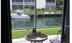Great community 55 and over, corner unit next to pool and Barbeque area,a "Piece of Peace" you can fish from your back yard, Dockage for $2.00 lineal, access to open ocean, less than 5 minutes to Peanut Island,close to Restaurants, supermarket, US1, I95.