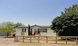 Double wide on permanent foundation and workshop sits on 4 lots. Owner has put alot of upgrades / repairs in the home. Corner lot near Tularosa High School. This home could be a mechanics dream with the space and workshop to work with. Will consider Owner