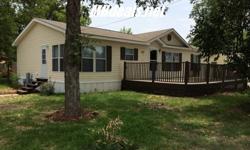 Made in 2007, this Beautiful 3 bed 2 bath Double wide manufactured home sits on a gorgeous .13 acres corner lot just within minutes of town. At 1,400 square feet (28 x 50). On the interiors you will have a Ceiling fan, Garden tub with separate shower in