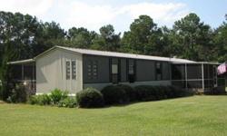 Neat and clean 2 BR single wide manufactured home on 2.4 acres. Desirable rolling North Alachua location with paved road frontage on CR 241. Home features 2 bedrooms, 2 baths and eat-in kitchen. Spacious front and back screened porches add extra living