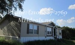 A Gorgeous Double Wide manufactured home with 5 acres of land. The land is a serene country setting, very easy to work with. The home can handle a fairly good amount of wind to a wind zone 1 criteria. The home is a big 1,568 square feet (28 x 56). This 3