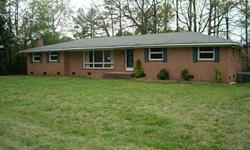 Full brick ranch on level lot and surrounded by much higher priced homes. Interior is in need of a major overhaul and would be perfect for an FHA 203K loan. Oversized entertainment room would easily fit a pool table with plenty of room left. Easy access