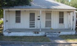 Older home with 3BRs, 1 Bath, LR, Kitchen with Dining Area, Front Porch & Storage in Back. Also has a separate efficiency apartment consisting of 1 BR, 1 Bath & Kitchen with Storage Facility. Vacant Lot is also included in the sale. Property Being sold