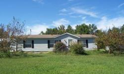 This mobile home is very well kept, neat and clean with 2.4 acres and a 40x20 garage with 110 electric and 220 plug. Property also has a nice storage building. The home is handicap accessible with a nice deck. Good country setting. Call Ronald Riordan
