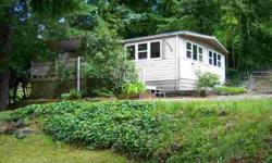 Good manufactured home on over .34 acre lot with privacy. This is a great starter home that is just over a block from Island Lake. The home is clean and ready to move in. There are 2 small additional parcels that go with this sale.
Listing originally