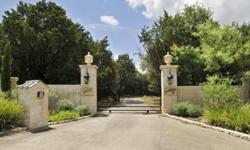 This is a rare find in Texas! 12 acres of riviera waterfront. Situated on the private north shore of Lake Travis, near Austin Texas. This Estate beauty is timeless in design and in immaculate condition. Private gated entrance with a country road taking
