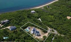 Set among the hills in prestigious Culloden Point. Close to everything Montauk yet away from the hustle and bustle is a one of a kind green home on 1.11 acres. Expertly crafted with Insulated Concrete Forms. 8" thick concrete walls. Windows and doors are