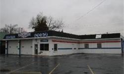 GREAT OPPORTUNITY TO OWN YOUR OWN BUSINESS IN DOWNTOWN COAL CITY! OVER 3300SF WELL-MAINTAINED HEATED BLOCK BUILDING WITH 6 BAYS & 13'X22' AIR CONDITIONED OFFICE & RECEPTION AREA, & 97'X124' CORNER LOT WITH 24 OFF-STREET PARKING SPACES. NEW ROOF COATING IN