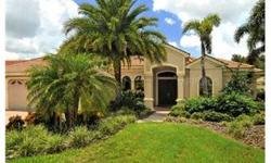 Located within the beautifully manicured Lakewood Ranch Golf & Country Club. This popular "Weldon" floor plan by Todd Johnston offers the finest in Florida living! Its many features include 4 bedrooms, 3.5 baths, an office, a gourmet kitchen with an