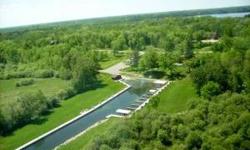 Exceptional place to build your new home in this 25 unit common interest community (CIC) located on beaurtiful Lake Andrusia and the Chain of Lakes. Outstanding harbor has 12 large boat slips and slip ''K'' belongs with this lot. Well maintained CIC