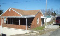 one story, brick, partial above ground full basement w/ 1 car garage attached. Gas forced air furnace/central air conditioning. Near downtown Fairmont just off I-79 at the Gateway connecter. 1/2 mile from the Kingmont exit off I-79. Quite with little