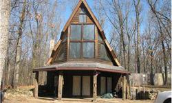You will love the very NATURE of it! A-frame home on 3.34 wooded lot with a 22x32 out-building. Kitchen, dining, bedroom, laundry and large bath on main floor. Large open second floor and another loft for an added bedroom if you wanted.Listing originally