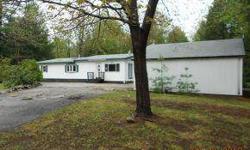 Double wide mobile home on a 1 acre level lot. Vinyl siding, newer windows and deck. Interior requires finishing. 1 Car detached garage. Septic has been tested and is in failing condition.This is a Fannie Mae Homepath Property.Listing originally posted at