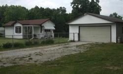 6 acres with a pond. There is a 2 bedroom mobile home, a 24 x 24 garage and a 11 x 17 shed with a cinder block basement. Also a 8 x 10 shed, a 8 x 8 shed, a 9 x 11 metal shed and a 5 x 8 wire shed.
Listing originally posted at http