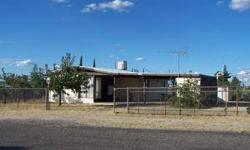 Great Location, 3 bedroom 1 bath home with 2-car carport, chain link fenced yard. 2 storage rooms attached to the carport and one separate shed. Views of the mountains and sunsets. About 25 minutes to Tucson. Great Starter Or Retiree Home.
Listing