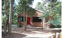 A Peaceful Mountain Retreat in Whispering Pines. This property has pine trees, aspen trees, meadows, and privacy. Natural gas so no propane worries. Two Fireplaces , a heatilator on the main level in the living room and a wood burning stove in the