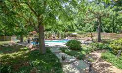 Beautiful outdoor oasis with Pool/Stone FP/Hot Tub, Oversized Bonus has room for TV/Play areas, Masters Up & Down, Renovated Kitchen w/glazed Cabs/Granite/Tile Bksplsh/Stainless, Tons of attic storage, 2 Lg Bds w/sitting areas, updated BAs