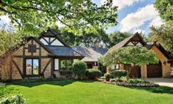 Like a rustic retreat nestled in the woods, this space soothes the spirit with a tonic of space, foliage, warmth &repose. An artful blend of modern amenities coupled w/old world Tudor charm the perfect union of location, condition&space!The focal point of