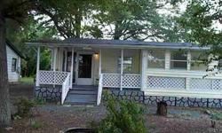 Rocking Chair front porch! Older home needs some TLC, but is very comfortable and has lots of potential. Investors take note! This road will give access to the Campbell Creek Greenway to be built in 2014 per Charlotte's Park & Rec director Gwen Cook. and
