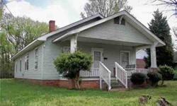 Large solid built home on level lot located very near I73/I74 and Sunset Avenue (downtown). Roof is approx. 13 years old and heat pump is approx. 8 years old. All appliances remain, incl. washer & dryer. Bath has an old claw foot tub. Storage bldg.