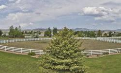 Elegant horse property on over 3.3 acres just outside Berthoud. Built in 1997, this stucco home boasts many upgrades