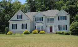Custom Colonial On Cul-De-Sac With Views in Desirable Rolling Hill section of Raritan Township. 11 Rooms, 4 Bedrooms, 3 ? Bathrooms, Gourmet Kitchen with Viking/Sub Zero Appliances/Granite Countertops, Step Down Family Room with Gas Burning Fireplace and