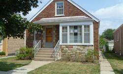 Two bedroom home in Chicago with one full bath. The home has hardwood floors through the living area. There is a living room, dining room and kitchen, along with two bedrooms each with private closets. The home has a full basment for extra storage. The