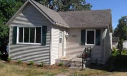 Cute, clean and completely renovated inside and out. Home has large kitchen w/ new appliances. Also has new siding, windows, furnace, hot water heater, flooring and more. Enjoy nice deck out back. This home is ready for moving in!Agent is relative of