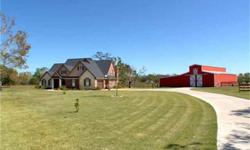 STUNNING HORSE RANCH! Gorgeous custom homes surround this 10 +/- acre prime tract in Manvel, with EZ access off of Hwy. 288. Custom home in a one-of-a-kind setting! 8-stall barn, lighted riding arena, exercise walker, 5 storage areas, tack room,