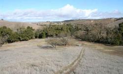 45acres on theSouthwest corner of South El Pomar and Rancho Roads. Features about 2,600' of paved road frontage along so. El Pomar and also based gravel road access from Rancho Road. Mostly open farmalnd with old almond & walnut trees and a ridge top