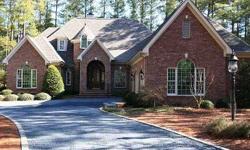 Beautiful all brick home at Pinewild Country Club, situated on the 18th fairway of the Magnolia Course. Incredible detail throughout including custommoldings and cabinetry. Wonderful home for entertaining with both formal and casual spaces. Large first