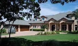 Located in the prestigious Grandview Estates subdivision, minutes from exemplary schools, Lake Travis and Lake Austin, this stunning estate sits on .88 of an acre offering privacy and breathtaking views! Originally built as his personal home, custom