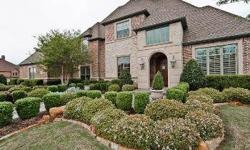 ABSOLUTELY STUNNING!A piece of paradise in Prosper!Views from the beautiful pool and outdoor living overlooking the 6th fairway are heaven. Kitchen is fabulous with professional series Viking appliances,warmering drawer,knotty alder cabinets,granite,sub