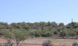 Custom home lot in North West Cave Creek. This lot is located in a nice secluded area and has power and pavement. Water is well water and will have to be drilled. Please call town for breakdown of impact fees. Nice views. Building envelope is limited due