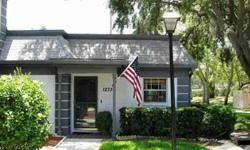 Best deal in Clearwater! Owner has priced this lovely villa to sell today! Updated corner unit villa! Move right in without having to do a thing! Ceramic tile thoughout, newer appliances, ceiling fans, and doors! Brand new central air/heatsystem! Custom