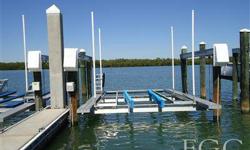 Spectacular Waterside floating concrete slip with a locked gate entry. Located in a 24 hour attended gated community. Must be a resident of Bay Beach to enjoy one of these wonderful assets and amenities. This slip offers a 20,000 lbs electric lift and is