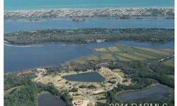 Here is great chance to own one of the biggest lots available in TOSCANA, a sanctuary of 31 distinctive homesites. This homesite backs to a preserve tidal lake. Bring your builder or select a custom designed plan from one of the preferred builders.