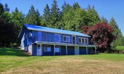 Exceptional, private, park-like setting on W Sequim Bay. Over 333 FEET of water front, (2.18 acres) including tidelands. Commanding view of the Straits, San Juan Islands and Sequim Bay Marina. Partially landscaped grounds blend with the unblemished,