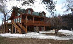 A very unique log home located on Paint Rock Creek. Fish right off the deck.
Listing originally posted at http