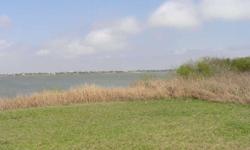 Look at this waterfront property! This is almost impossible to find anymore, 5 acres on the bay with 158 feet of waterfront. This property is located about 1 1/2 hours from Houston and about 2 1/2 hours from San Antonio and Austin. Carancahua bay is home
