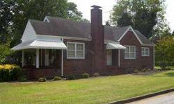 A BEAUTIFUL HOME ONE OWNER FULL BRICK FORMAL LIVING ROOM DINNING ROOM LARGE EAT IN KITCHEN SMALL DEN 2 LARGE BEDROOMS HARDWOOD FLOORS . COVER FRONT PORCH DECK ON BACK WITH LARGE 2 CAR GARAGE. BEAUTIFUL LEVEL LOT WITH BEAUTIFUL TREES. CUTE STREET.Listing
