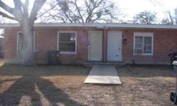 Duplex consisting of 2BRs, 1 Bath, LR-DR Combination, & Utility Room on each side. Kitchen with stove and refrigerator on each side.
Listing originally posted at http