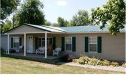 Large manufactured home with large rooms enjoy the large family room with woodburning fireplace. Rick MacPherson is showing this 3 bedrooms / 2 bathroom property in Morganfield, KY.Listing originally posted at http
