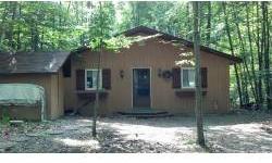 Great cabin or year around home on 2 wooded lots. Large entertaining deck with a great view of wildlife. Snowmobiling trails, deeded assoc. access on all-sport Rose Lake. What a great place to enjoy anytime. Chech this one out today.Listing originally