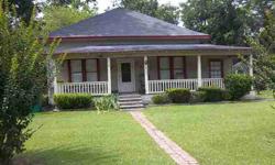 This home is loaded with character and newer updates. Very well maintained home that could easily be transformed into a three bedroom. The house sits on three lots and has four pecan trees and pretty crape mrytles. Enjoy relaxing on the large front porch