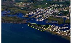 One of the most amazing properties in all of Southwest Florida. Situated on the northern tip of Pine Island, this waterfront Bokeelia estate encompasses over 6.5 acres directly on Charlotte Harbor and surrounded by Jug Creek and Shell Pass. The